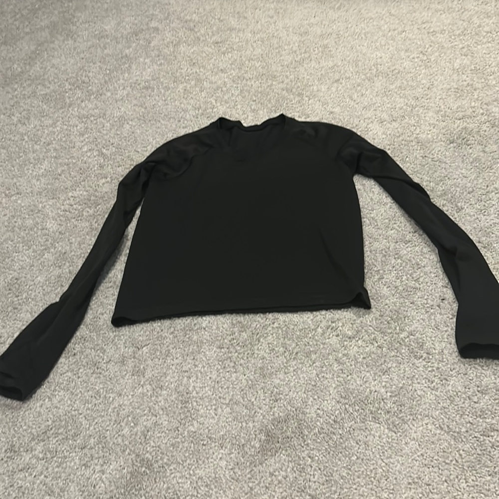 Never worn black long sleeve with thumb slits on sleeves